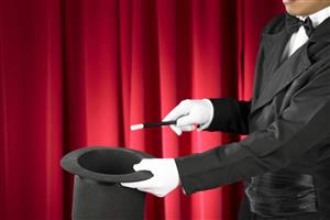 Magician with a wand and top hat.